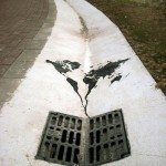 The world going down the drain -Street-Art-by-Pejak-in-Santander-Spain