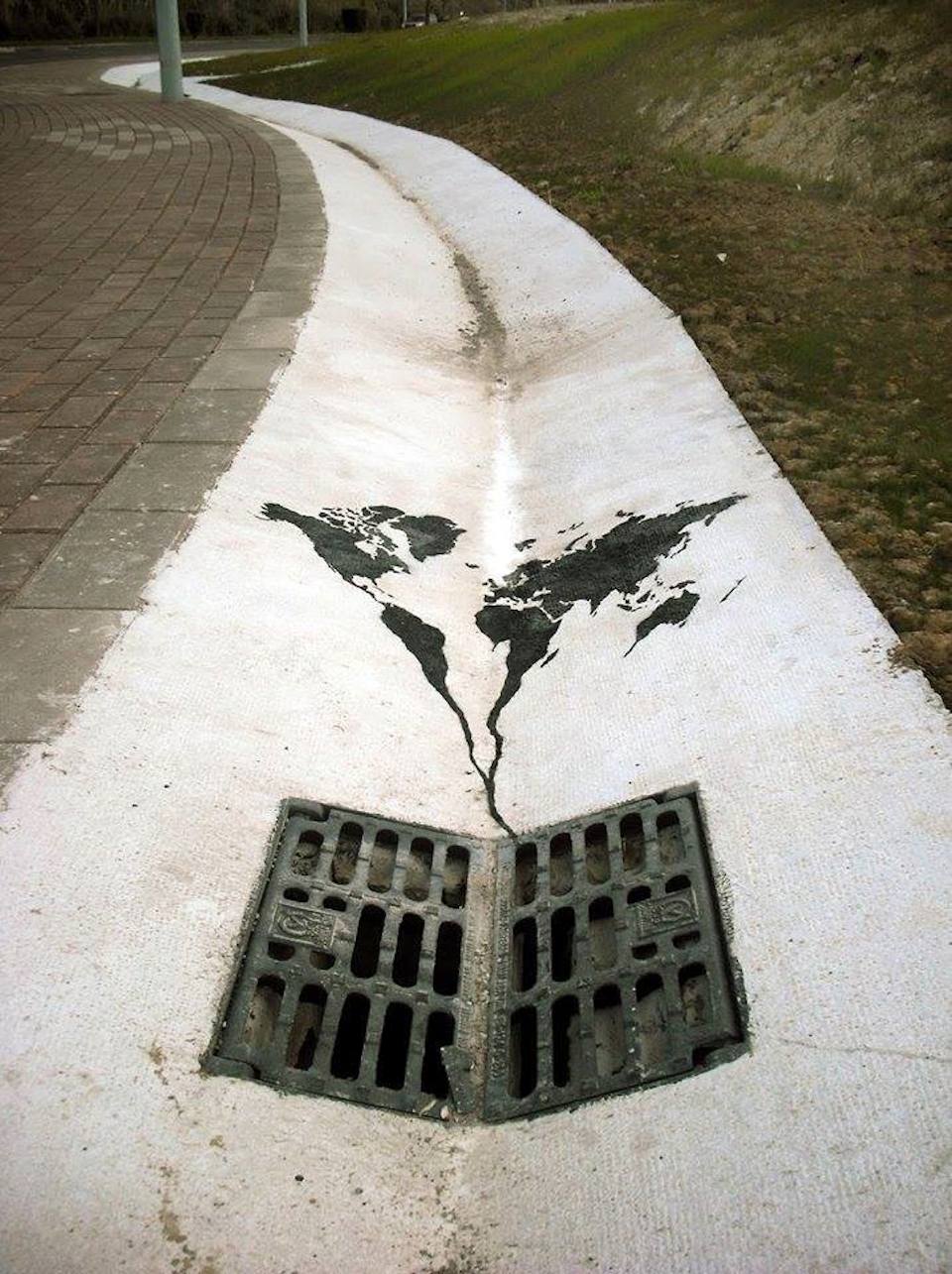 The world going down the drain -Street-Art-by-Pejak-in-Santander-Spain