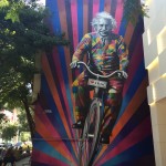 Genial is riding a bike. Street Art by Kobra in São Paulo, Brazil 1
