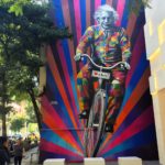 Genial is riding a bike. Street Art by Kobra in São Paulo, Brazil 2