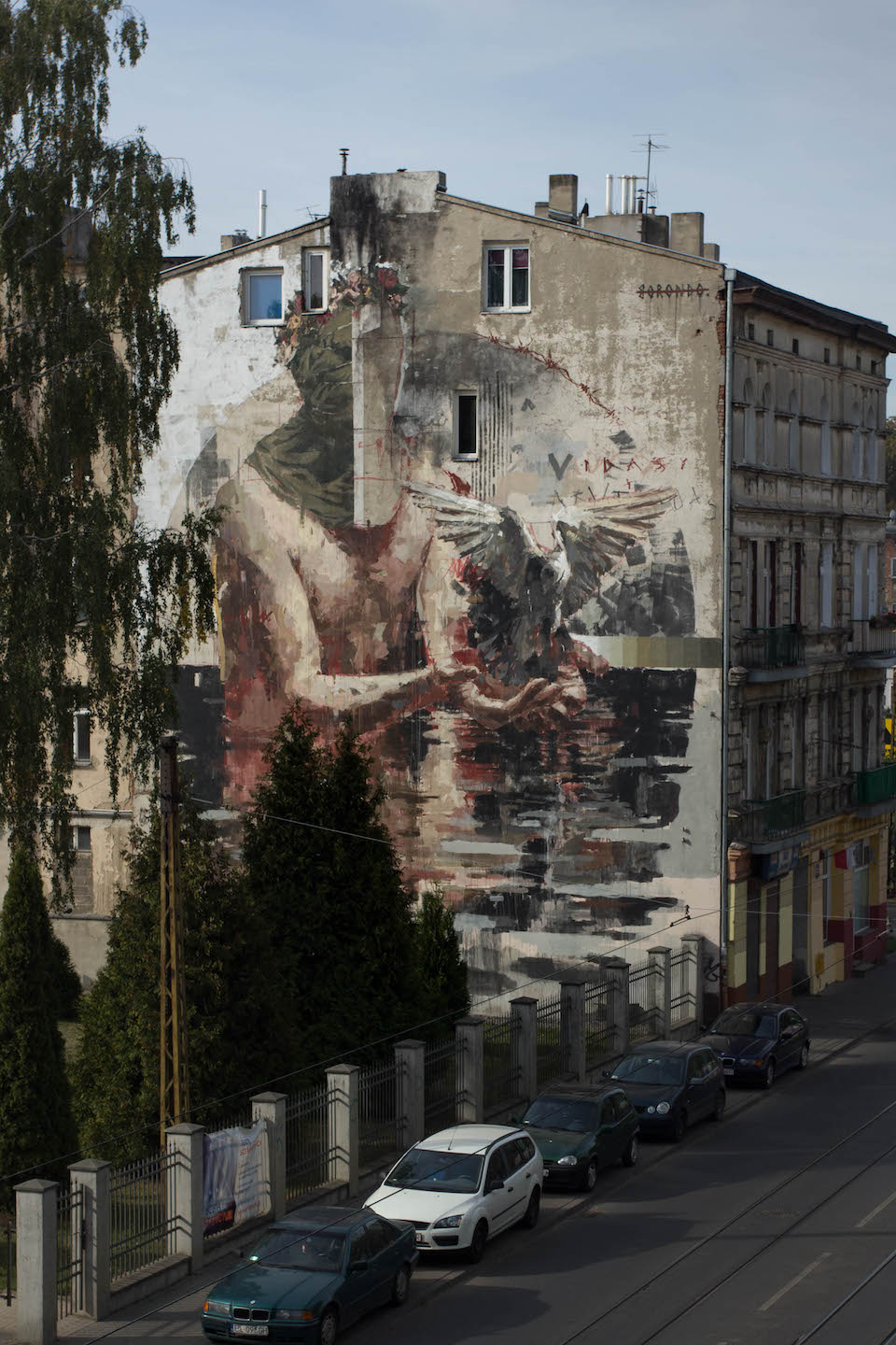 Mural by Borondo in Lodz, Poland 4