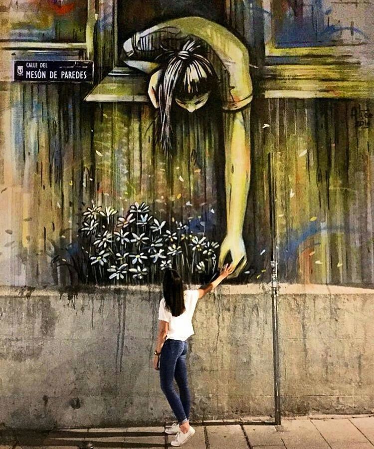 Street Art by Alice Pasquini in Madrid, Spain