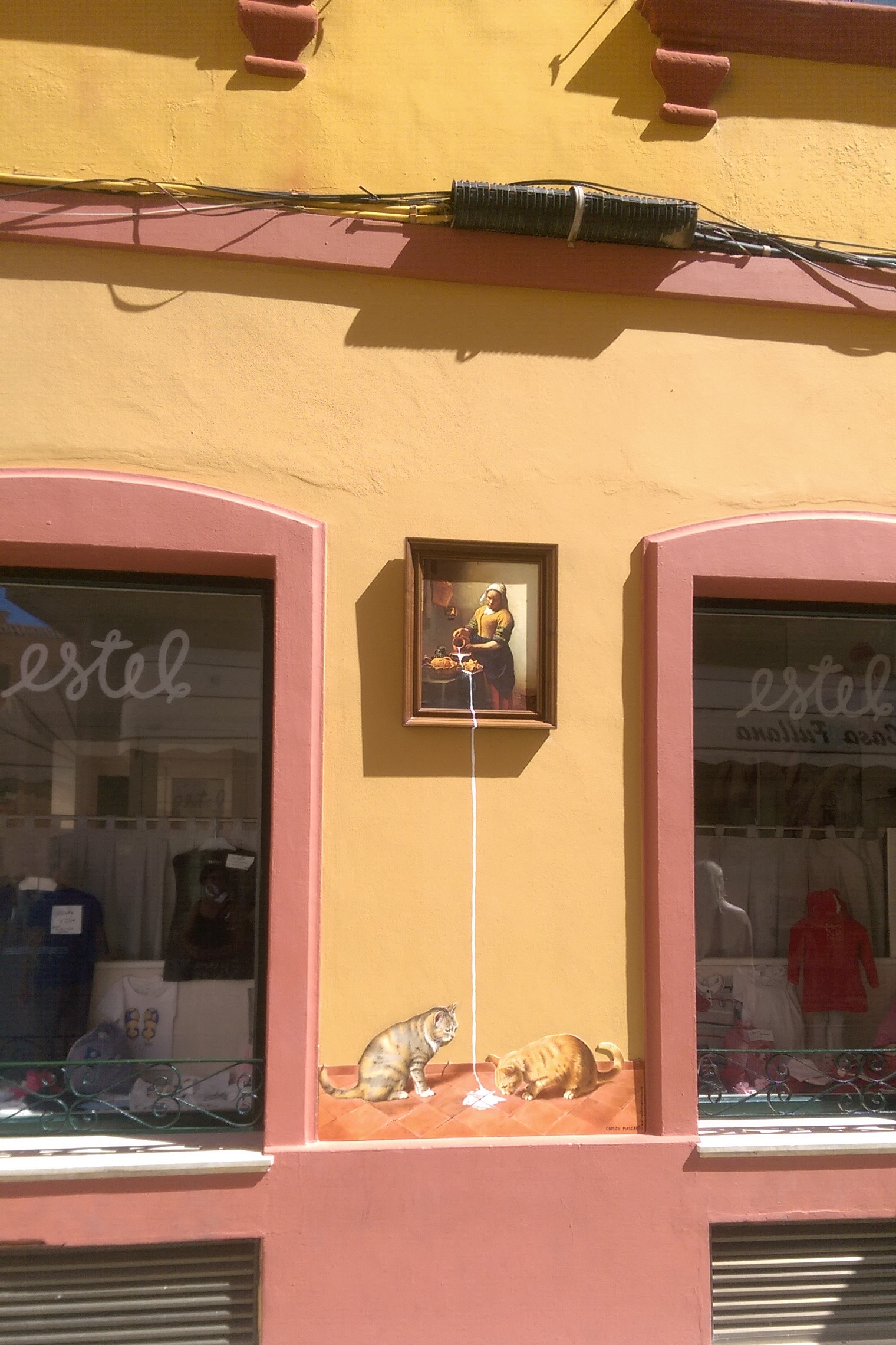 Street Art based on The Milkmaid in Ciutadella, Menorca Spain