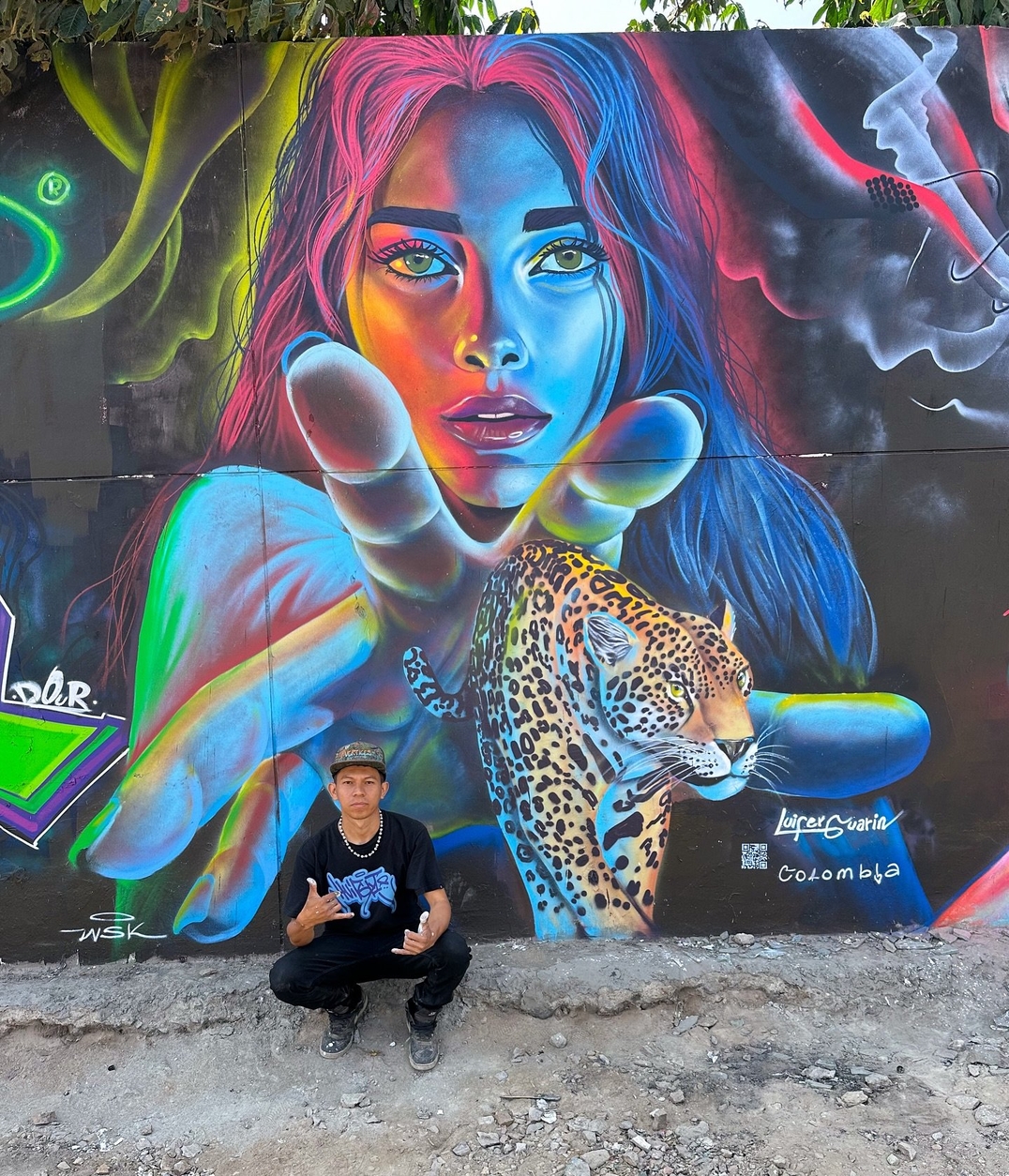 She Reaches Through the Wall: Neon Jungle Mural by Luisfer Guarín in Peru